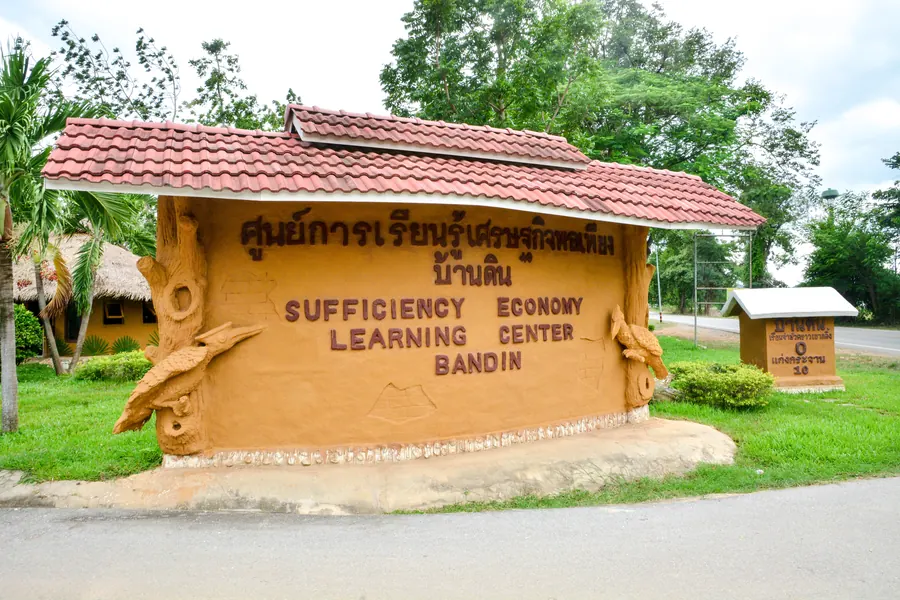 Entrance signage at Sufficiency Economy Learning Center Baan Din