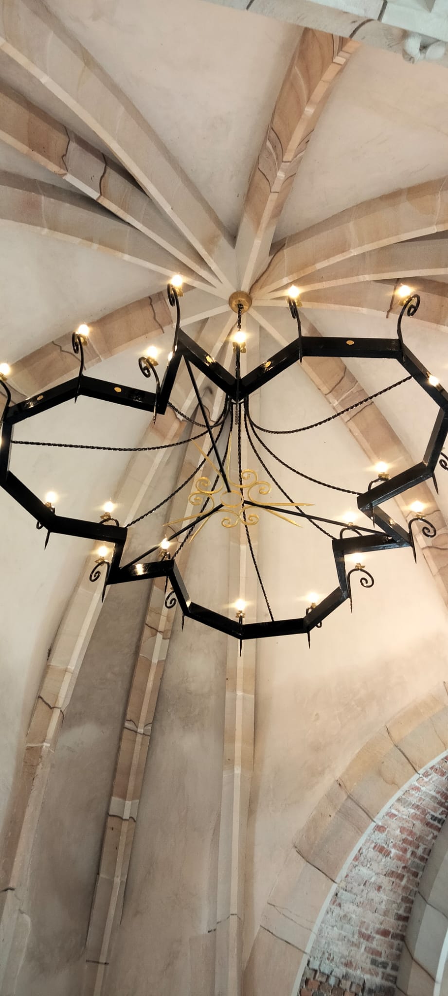 Forged steel chandelier shaped like the chapel