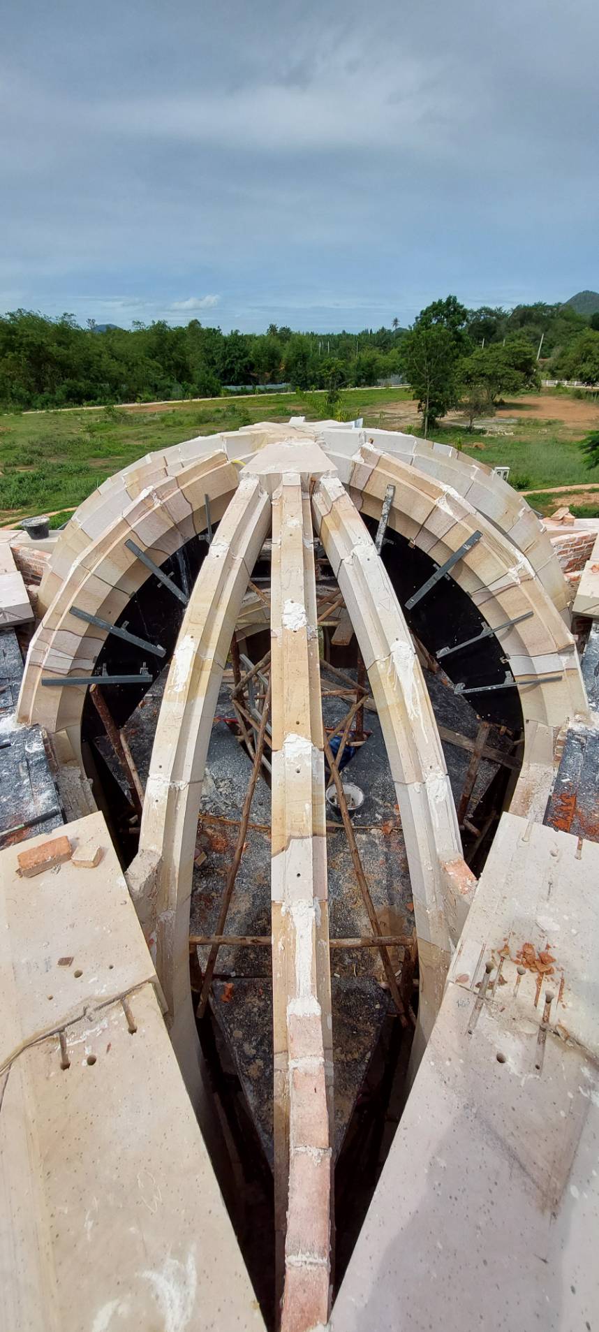Stone ribs and central keystone before brick infill