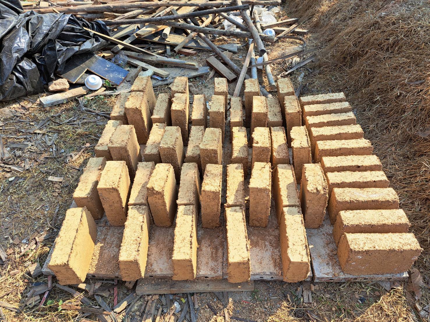 Earth blocks air curing after pressing